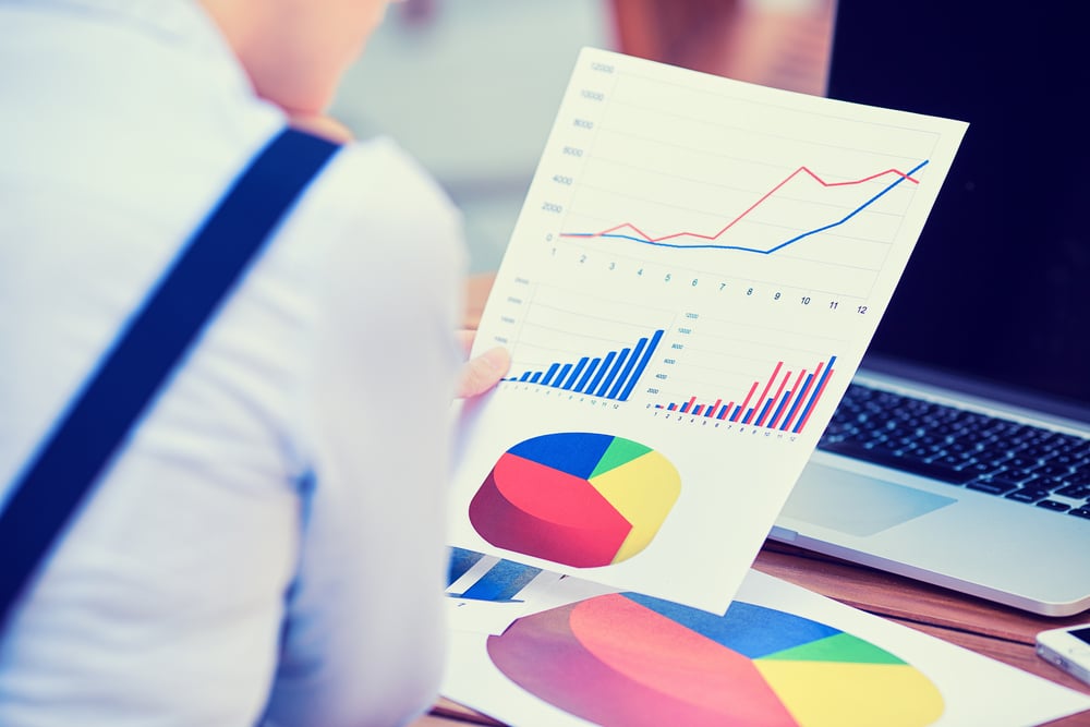 woman investment consultant analyzing company annual financial report balance sheet statement working with documents graphs. Stock market, office, tax, education concept. Hands with charts papers woman investment consultant analyzing company annual financial report balance sheet statement working with documents graphs. Stock market, office, tax, education concept. Hands with charts papers